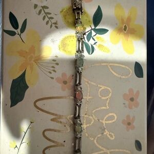 Vintage fire opal. Broken clasp. Very tarnished.  Stainless steel